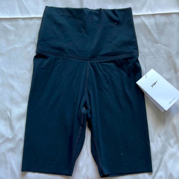 Nike Pants - Nike Yoga Lux High Rise Bikers Short.  Brand New with tag.